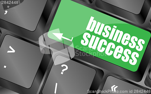 Image of business success button on computer keyboard key