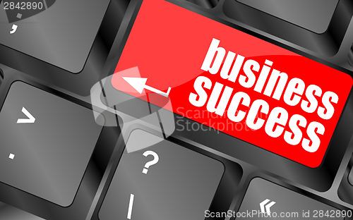 Image of business success button on computer keyboard key