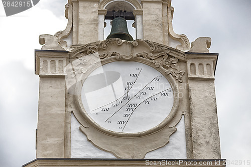 Image of sundial on the clock tower 