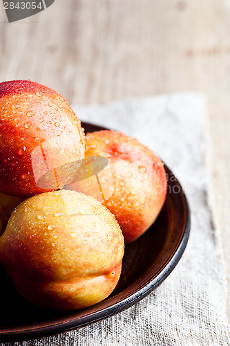 Image of fresh nectarines with water drops