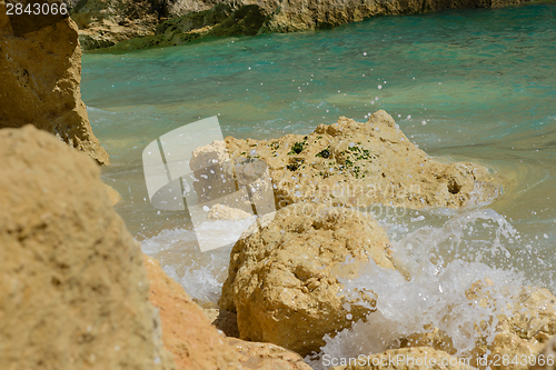 Image of Splashes from the waves on the rocks