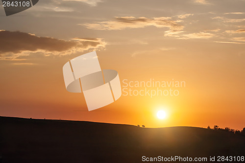 Image of Silhouette of hill on sunset