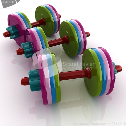 Image of Colorful dumbbells on a white background