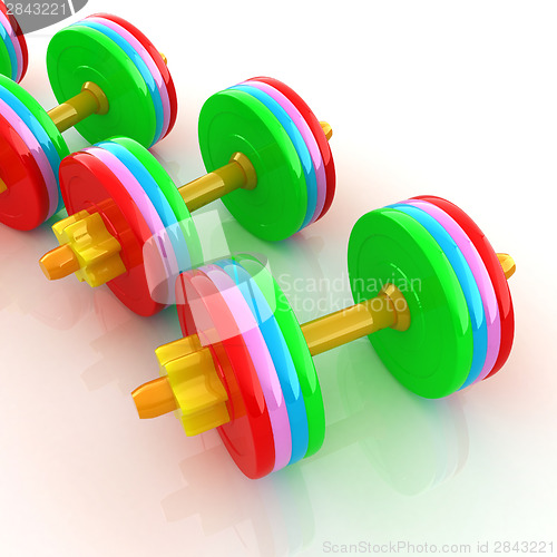 Image of Colorful dumbbells on a white background