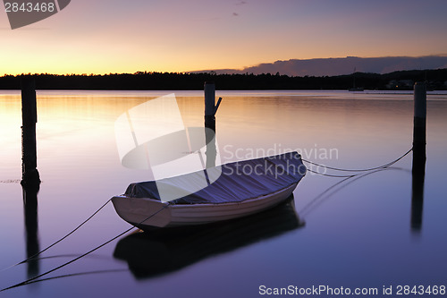 Image of Sunrise at Woy Woy with little boat and moorings