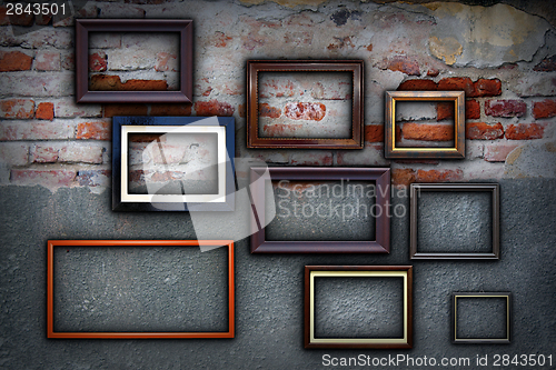 Image of frames on cracked ancient wall