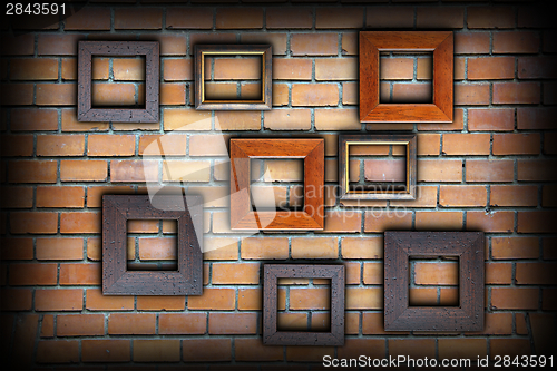 Image of brick wall with wood frames