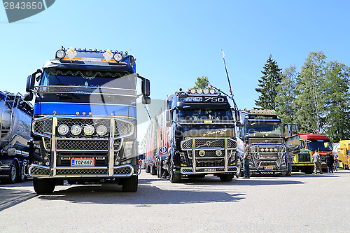 Image of Row of Show Trucks at Riverside Truck Meeting