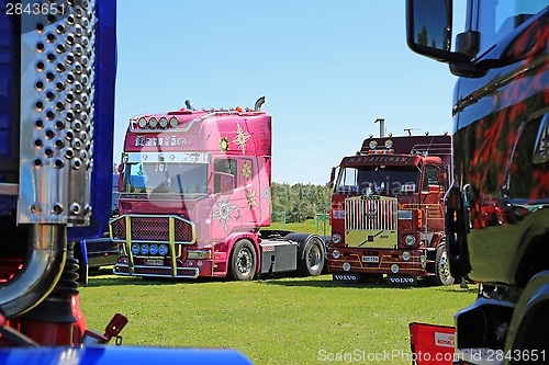 Image of Pink Scania and Volvo F88 Vintage Truck in a Show