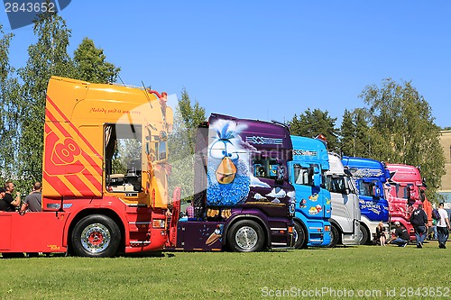 Image of Row of Colorful Show Trucks