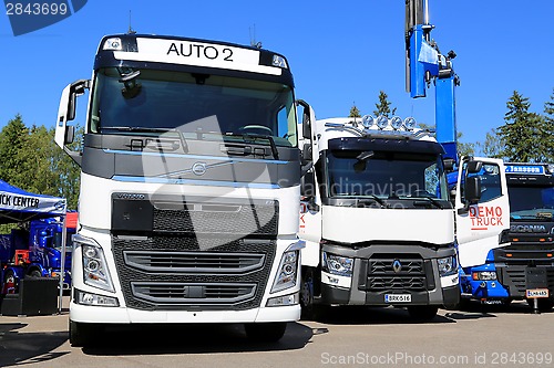 Image of White Volvo and Renault Trucks