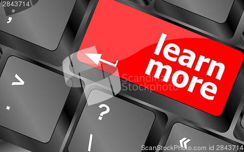 Image of education concept with learn more button on computer keyboard