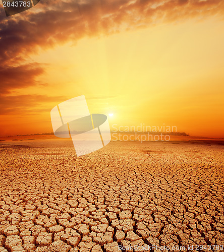 Image of hot orange sunset over desert