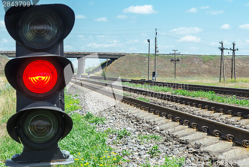 Image of red semaphore near railroad