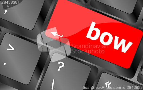 Image of bow button on computer pc keyboard key