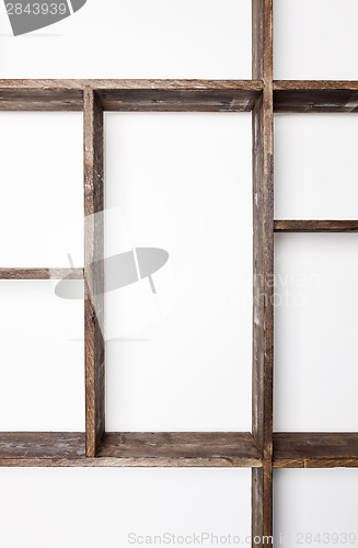 Image of Rustic style shelves on white wall