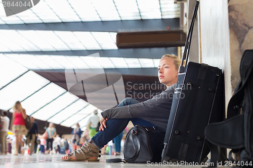 Image of Female traveler waiting for departure.