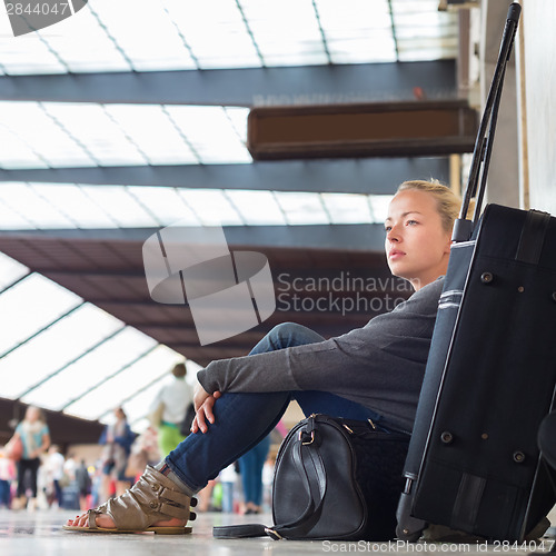 Image of Female traveler waiting for departure.