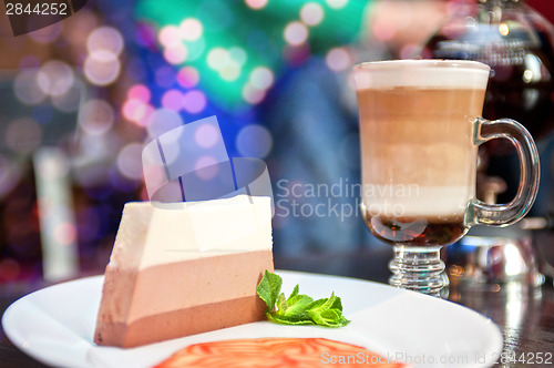 Image of tasty cake with coffee cup
