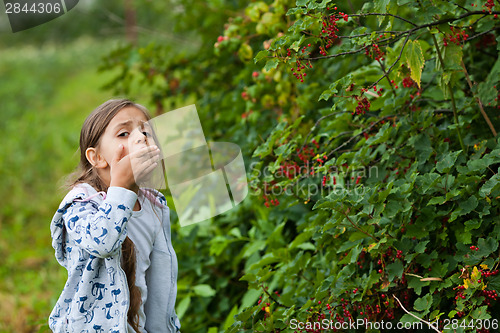 Image of Little girl in the garden