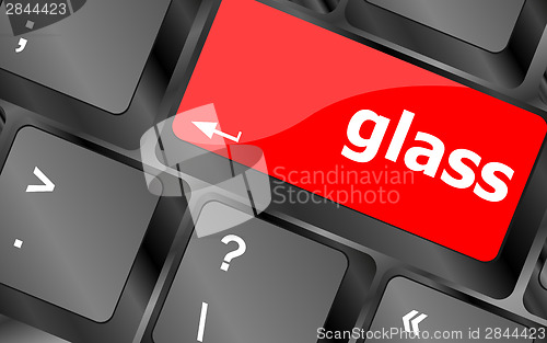 Image of glass word on keyboard key, notebook computer button