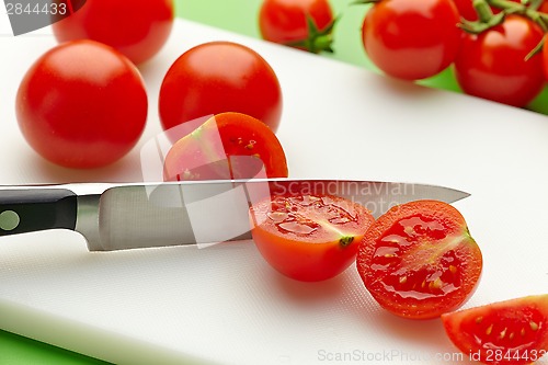 Image of fresh tomato on cutting board