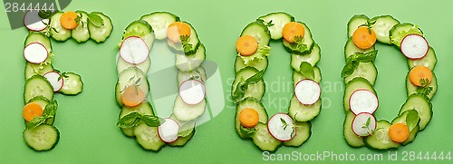 Image of Food word made of raw vegetables