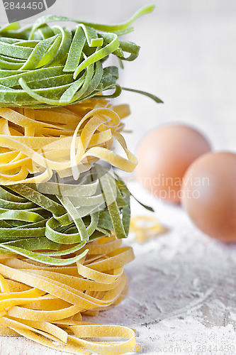 Image of italian pasta tagliatelle, flour and eggs