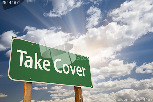 Image of Take Cover Green Road Sign