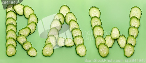 Image of RAW word made of cucumber slices