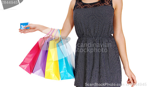 Image of Girl with three bag's.