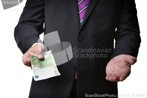 Image of Businessman offering banknote