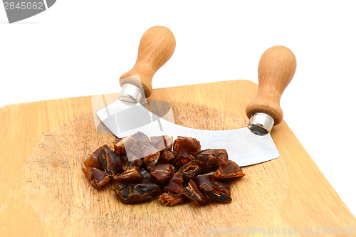 Image of Chopped dates with a rocking knife 