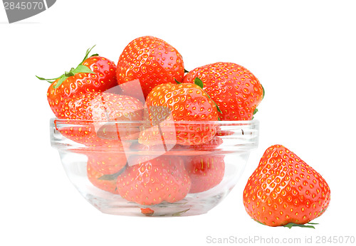 Image of Red strawberries in transparent plate isolated on white