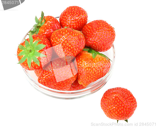 Image of Red strawberries in transparent plate isolated on white