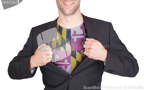 Image of Businessman opening suit to reveal shirt with state flag