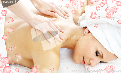 Image of professional massage with flowers #2