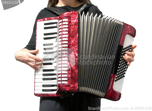 Image of Cutout with a woman playing accordion on white