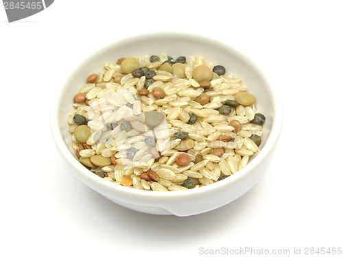 Image of Mixed lentils with brown rice in a bowl of chinaware