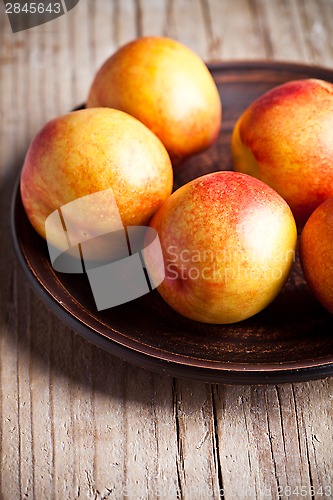 Image of fresh nectarines in a plate 