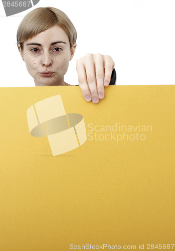 Image of Woman holding a paper