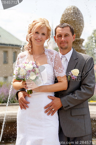 Image of beautiful young wedding couple