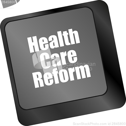 Image of health care reform shown by health computer keyboard button