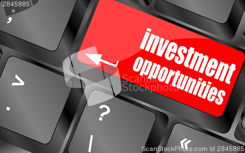 Image of invest or investing concepts, with a message on enter key or keyboard.