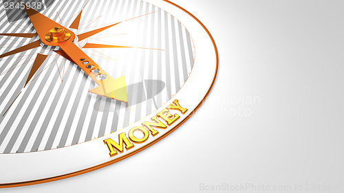 Image of Money on White with Golden Compass.