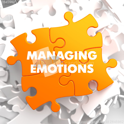Image of Managing Emotions on Yellow Puzzle.