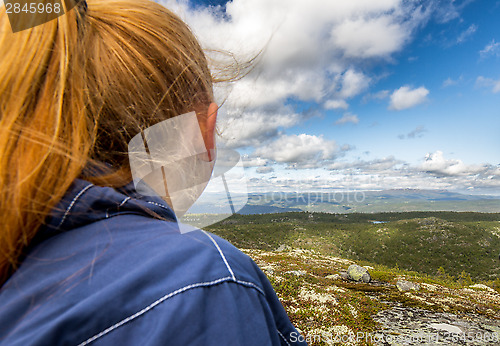 Image of mountain in Norway and girl