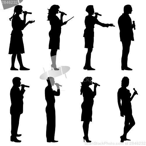 Image of Black silhouettes of  mans and womans singing karaoke on white b