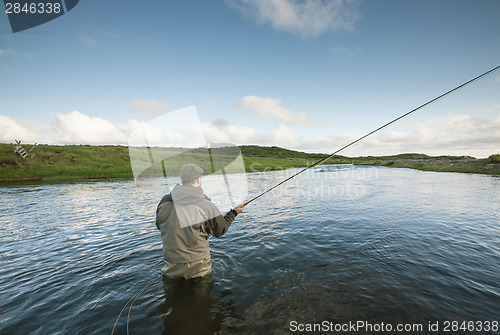 Image of Flyfisherman casting