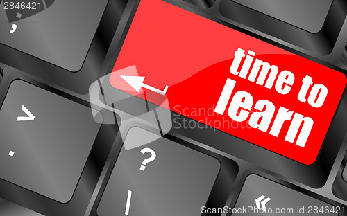 Image of time to learn - close up view on conceptual keyboard
